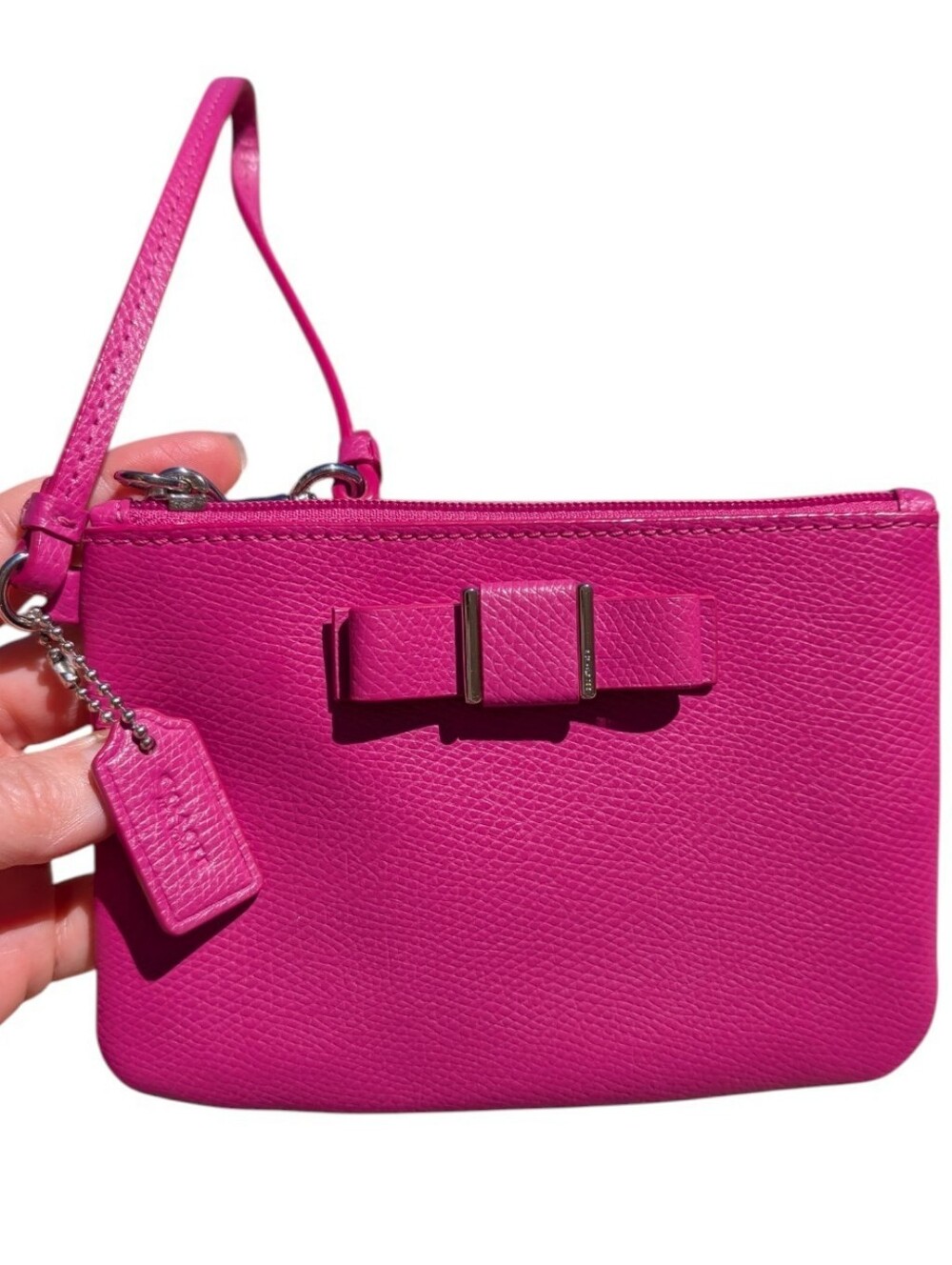 Coach Women's Wristlet Pouch in Bright Fuchsia with Bow Detail